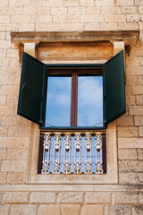 Window in an old historic building. Retro architecture. Summer in Croatia. Dubrovnik
