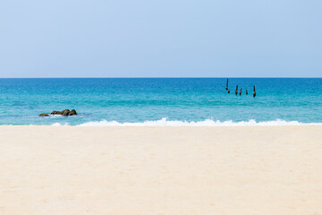 Tropical beach in south of Thailand, white sandy beach with blue sea, summer season background
