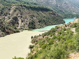 The river Chirchik joins another smaller river and there are filters at that point. The cloudy...