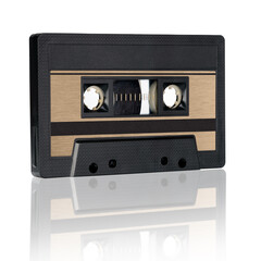 Retro black audio cassette isolated on white background, close up.