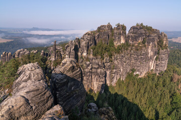 View of the beautiful landscape from the top of the cliff. Sandy mountains of Saxon Switzerland. Love for travel. To discover the outside world. Adventure World.