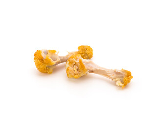 Chicken bones, food scraps, and fried chicken bones cut or isolated on a white background