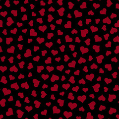 Seamless Pattern of Scattered Red Hearts on Black Background