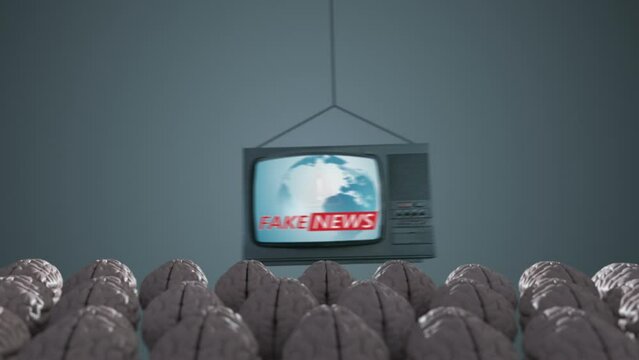 Fake News text on TV screen. Concept of influence of media on people. Broadcasting, false information, hoax, propaganda, brainwashing, information and disinformation concept. Information war.