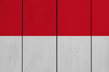 Patriotic wooden plank background in colors of flag. Indonesia