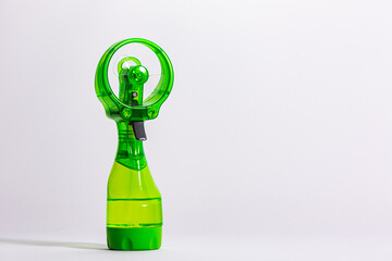 hand held water bottle mister with battery powered fan