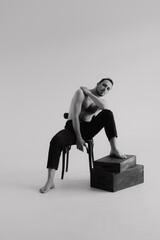 guy sitting on a chair