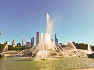 Chicago's Buckingham Fountain, one of the largest in the world, in the windy city's Grant Park on a beautiful summer day with skyline or buildings in the background.