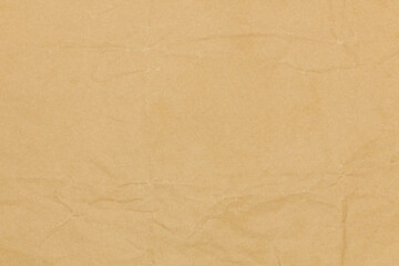 Beige paper texture. Abstract background. Smooth brown wrapping kraft paper. Copy space for text