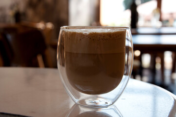 Frappe iced coffee beverage served in glass