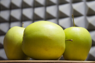 Several green apples, side view. Fruit close-up.