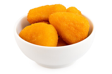 Fried breaded brie nuggets in a white ceramic bowl on white.