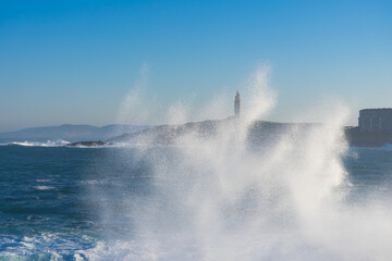 The tower of Hercules behind the wave