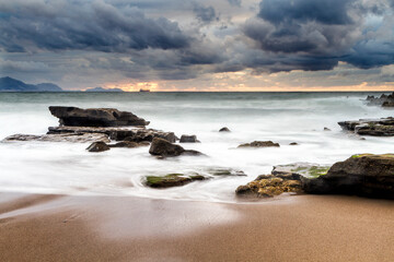 Sunset at Azkorri beach in the coast of Biscay, Basque Country, north of Spain. 