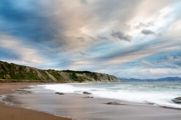 Sunset at Azkorri beach in the coast of Biscay, Basque Country, north of Spain. 