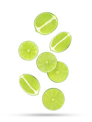 Sliced fresh lime fruit falling in the air isolated on white background.