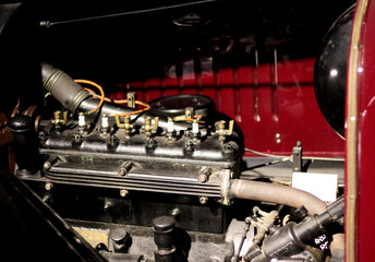 Retro car's engine close up photo. Vintage vehicle in details. 
