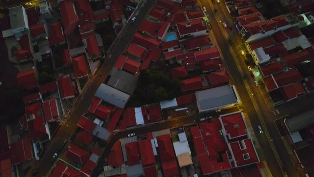 Aerial image of the city of Pirassununga, in the interior of S&atilde;o Paulo, in the Vila Brasil neighborhood, with a view of the sunset and night image of the city