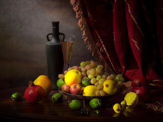 Still life with fruit and wine on a dark background © 02irina