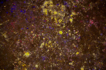 Holi Color Splash in Mud texture Background