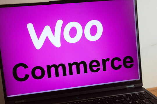 KONSKIE, POLAND - July 11, 2022: WooCommerce e-commerce plug-in for WordPress logo displayed on laptop computer