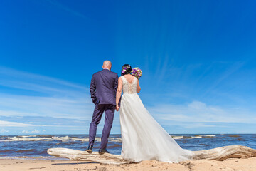 bride and groom on the beach