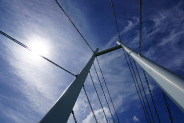 Modern cable-stayed bridge, sky and sun