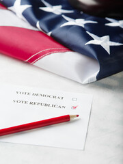 Fototapeta na wymiar Election campaign. Vote for Democrats and Republicans. parliamentary elections. American flag and piece of paper, red pencil. Elections, voting. Banner, poster, advertising.