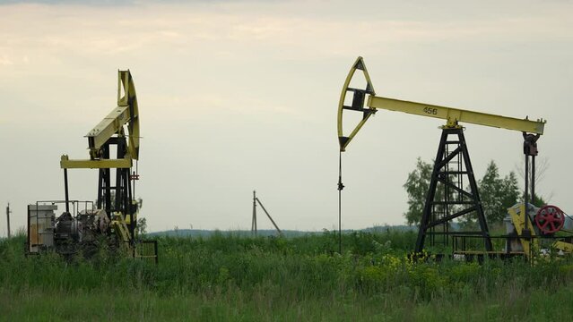Oil production. minerals. gasoline, gas. Transport. oil for the comfort of people's lives. green energy. black goldMining and quarrying. Installations for the extraction of oil from the bowels of the