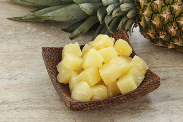 Marinated pineapple slices in the bowl