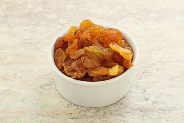 Sweet yellow raisin in the bowl
