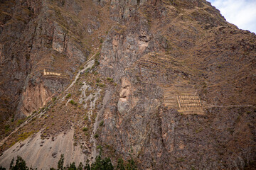 Barn and crop cellar in Inca ruins at Ollantaytambo in the Sacred Valley in Cusco, Peru
