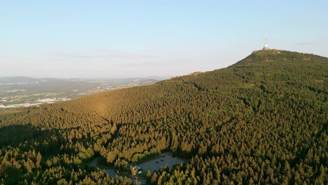 Jested Tower, Hotel, Restaurant and TV Tower in Liberec Czech Republic lit with sunset
