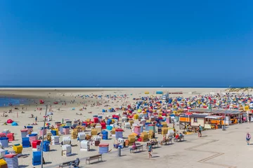 Printed kitchen splashbacks Descent to the beach Colorful traditional beach chairs at the boardwalk of Borkum, Germany