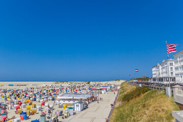 Boardwalk and beach at the coast of Borkum, Germany © venemama