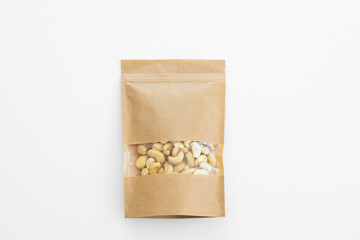 Cashew in a package on a white background