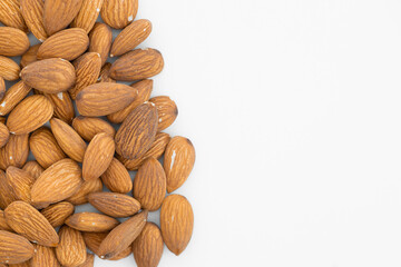 Almond nuts on isolated white background