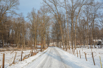 Snowy back road through the woods in Amish country, Ohio