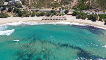 Aerial drone photo of famous bay and sandy beach of Mesakti, popular for surfing sports, Ikaria island, Northeast Aegean, Greece