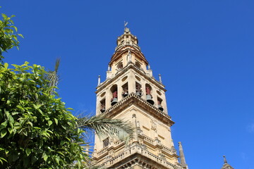 Tower of the Mezquita Cathedral of Cordoba on a bright sunny day, Spain.