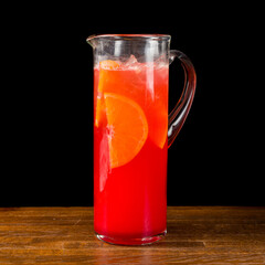 Strawberry lemonade on the bar on wooden table