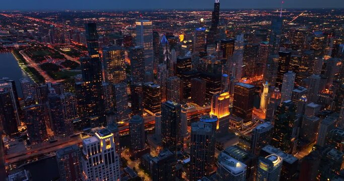 Eye-catching view of Chicago downtown in the evening. Stunning metropolis in lights from view above.
