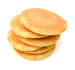A stack of plain pancakes on a white background.