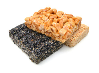 Honey bars with peanuts, sesame and sunflower seeds isolated