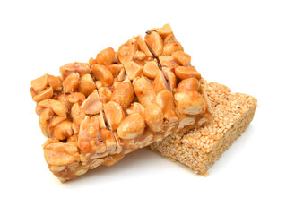 Honey bars with peanuts, sesame and sunflower seeds isolated