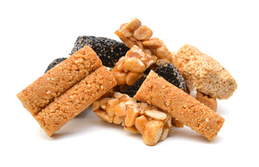 Honey bars with peanuts, sesame and sunflower seeds isolated