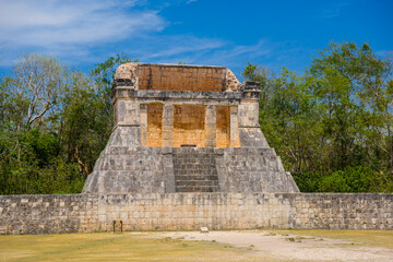 Fototapeta na wymiar Temple of the Bearded Man at the end of Great Ball Court for playing pok-ta-pok near Chichen Itza pyramid, Yucatan, Mexico. Mayan civilization temple ruins, archeological site