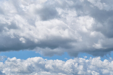 Cumulus clouds on blue sky, copy space . Background for text.