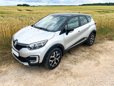 Poznan, Poland - 07.11.2022: Renault Kaptur on a field with flowering rye