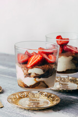 tiramisu in a glass with strawberries 